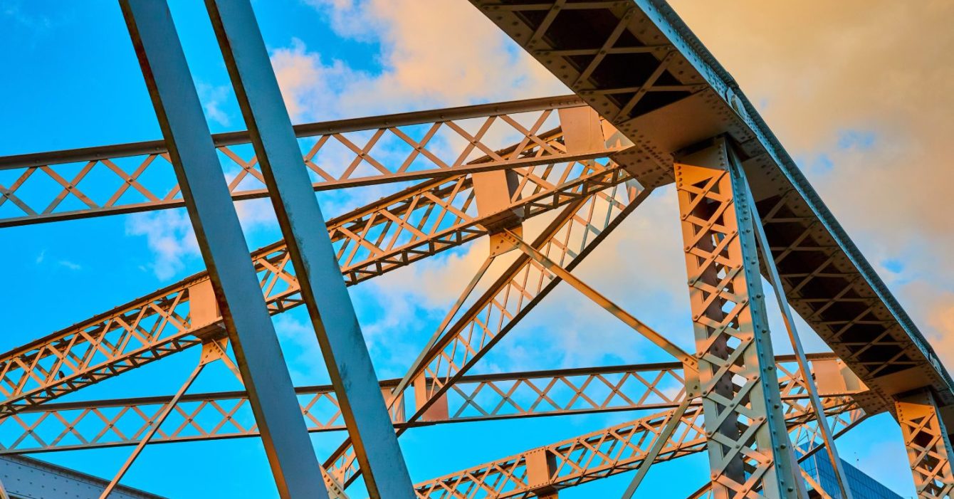 Steel,Bridge,Geometry,At,Sunrise,Low,Angle,View Steel,Bridge,Geometry,At,Sunrise,Low,Angle,View