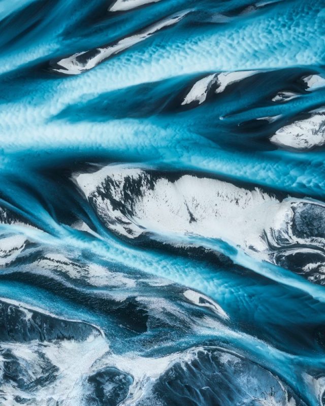 Top,View,Of,Dramatic,Abstract,Icelandic,Glacier,River,Delta,Flowing