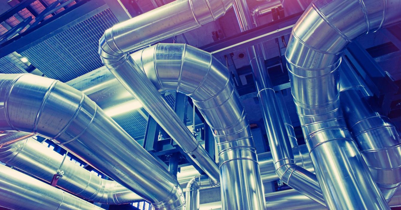 Equipment,,Cables,And,Piping,As,Found,Inside,Of,A,Modern